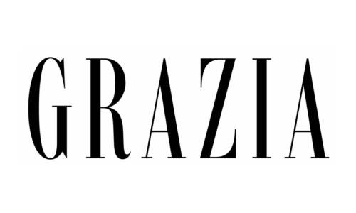 Das Bild zeigt das Wort GRAZIA in fetten, eleganten, schwarzen Großbuchstaben auf einem weißen Hintergrund.